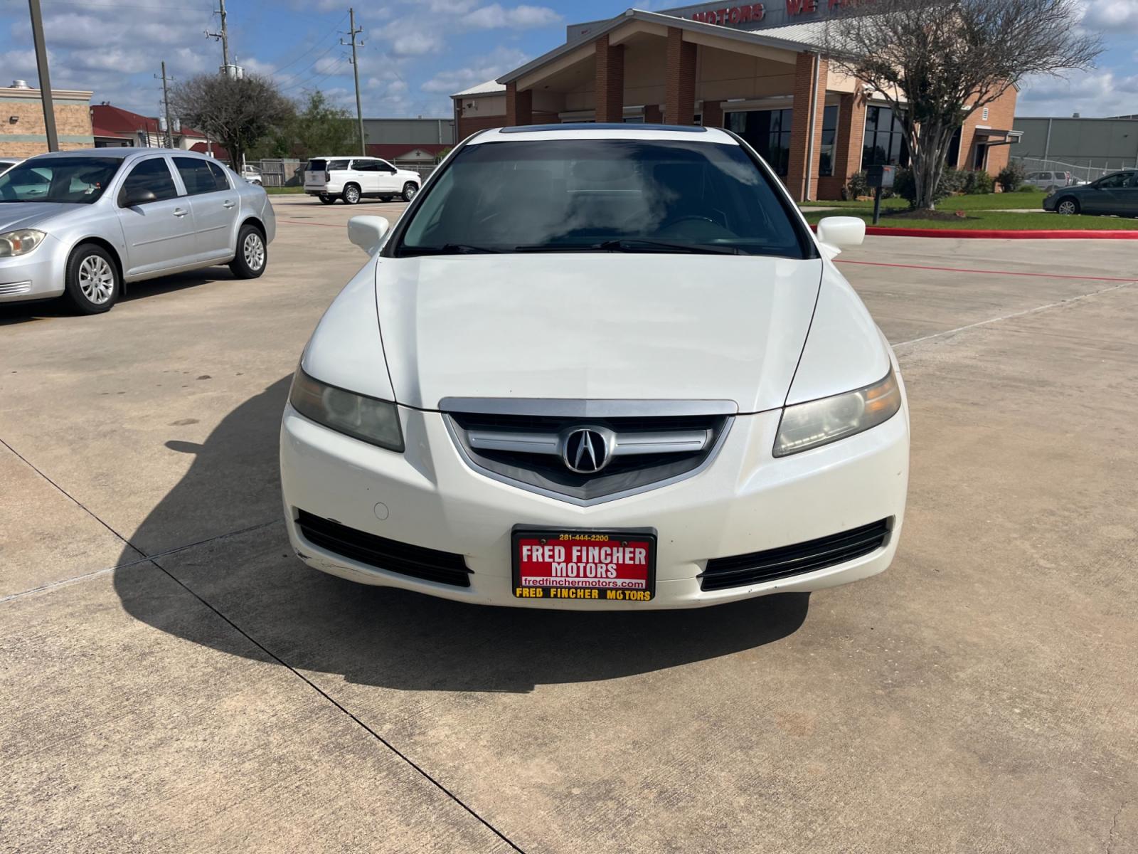 2006 white /TAN Acura TL 5-Speed AT (19UUA66206A) with an 3.2L V6 SOHC 24V engine, 5-Speed Automatic Overdrive transmission, located at 14700 Tomball Parkway 249, Houston, TX, 77086, (281) 444-2200, 29.928619, -95.504074 - Photo #1